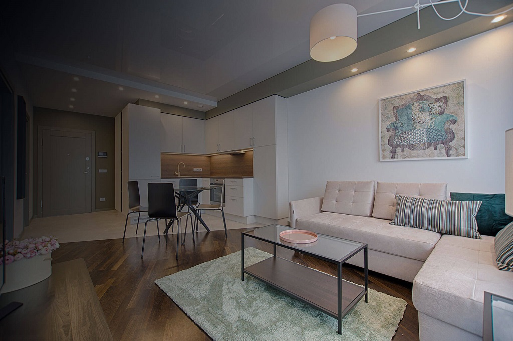 Household Insurance web page Featured Image - Picture of modern apartment lounge and dining area,